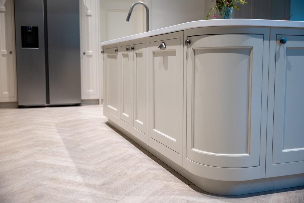 Close-up photography of kitchen island, cabinetry and worktop details in a Southport home.