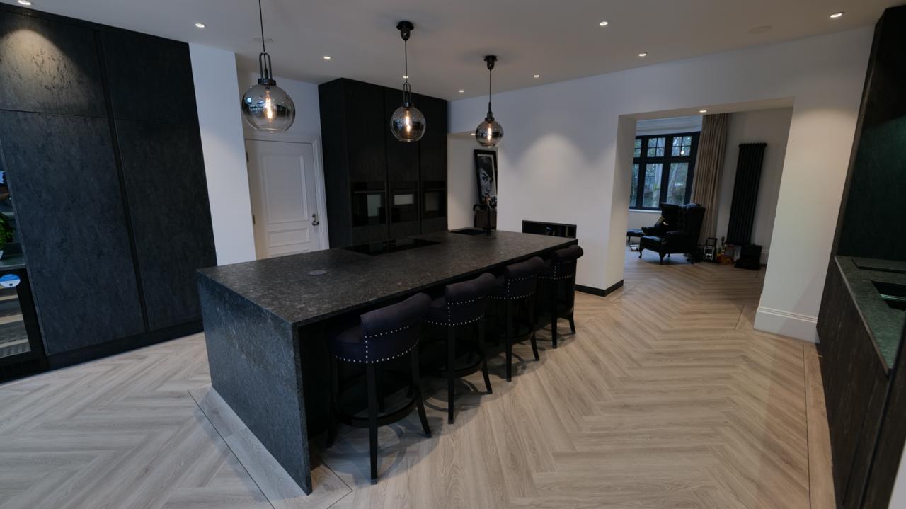 Modern fitted kitchen with island unit photographed for Thomas Howie Kitchens and Bedrooms in Southport, Merseyside.