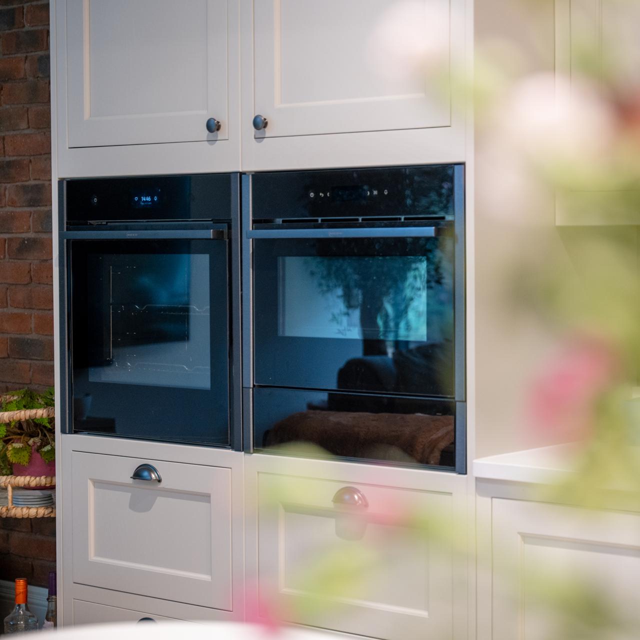 Close-up content and photography of kitchen appliances, cabinetry and worktop details in Southport home.