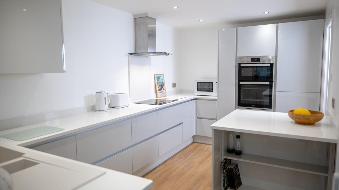 Spacious family kitchen designed by Thomas Howie Kitchens and Bedrooms in Southport.