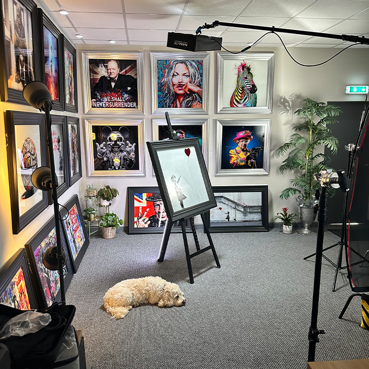 A content shoot at Surfr Media studio in Southport. The studio has been set up to look like a gallery of framed liquid art pieces.