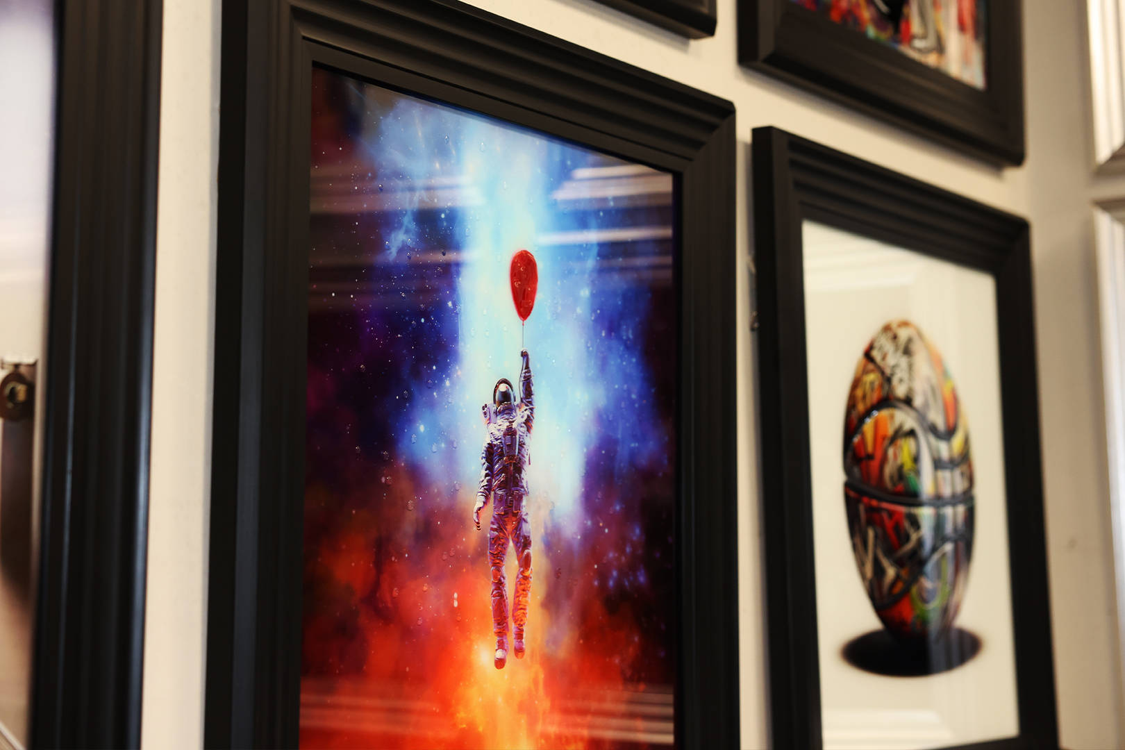 Liquid art hanging on the wall at Surfr Media Studio in Southport.