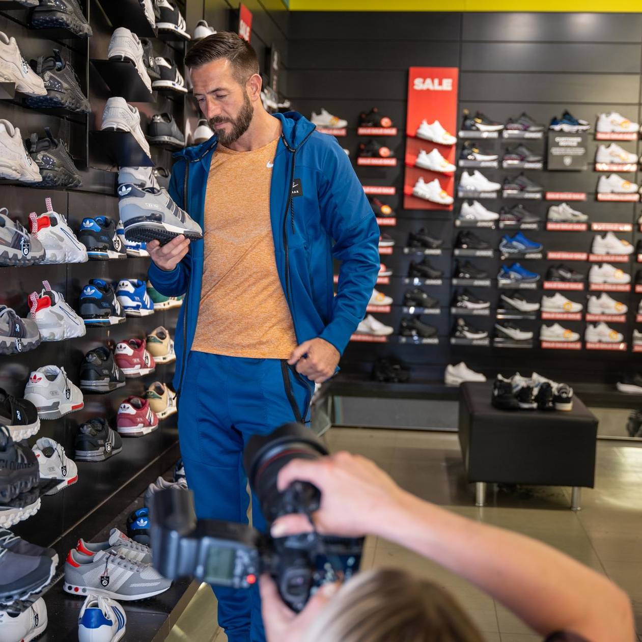 A model poses for a photograph at JD Sports in Eagles Meadow Shopping Centre in Wrexham.
