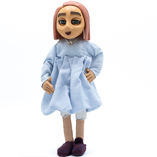 A hand crafted stop motion puppet of Natalie Gardner, part of a stop motion accessibility campaign supporting AccessAble Detailed Access Guides.