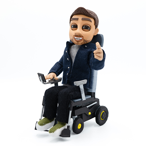 A hand crafted stop motion puppet of Ross Lannon, a character created for inclusive healthcare accessibility animation campaign.