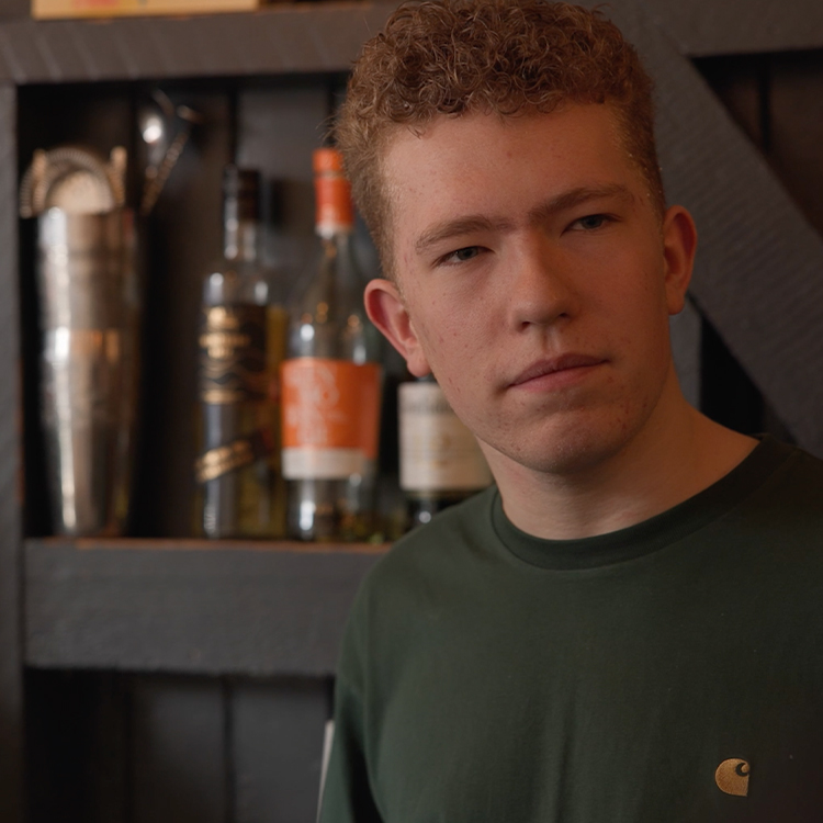 A student on Work Experience is filmed for the school video in London.