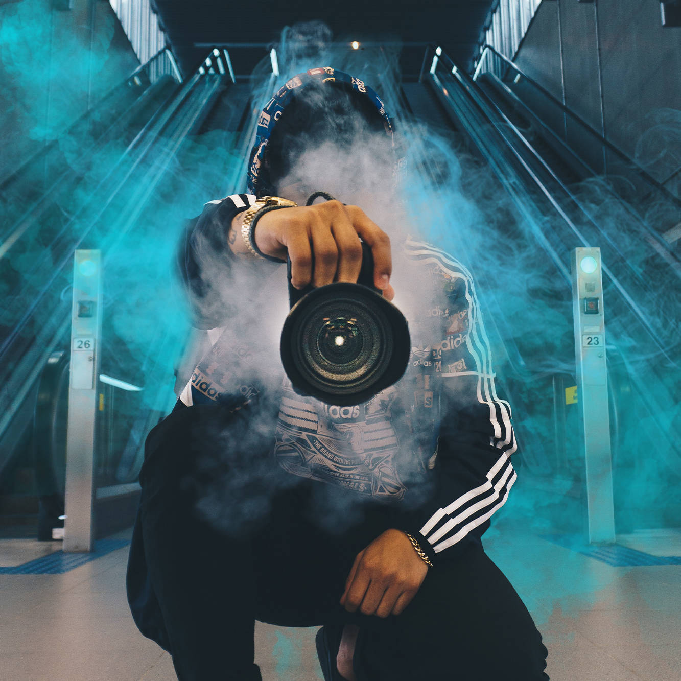 An image of a photographer surrounded by smoke used as part of a sales deck design created by Surfr Media.