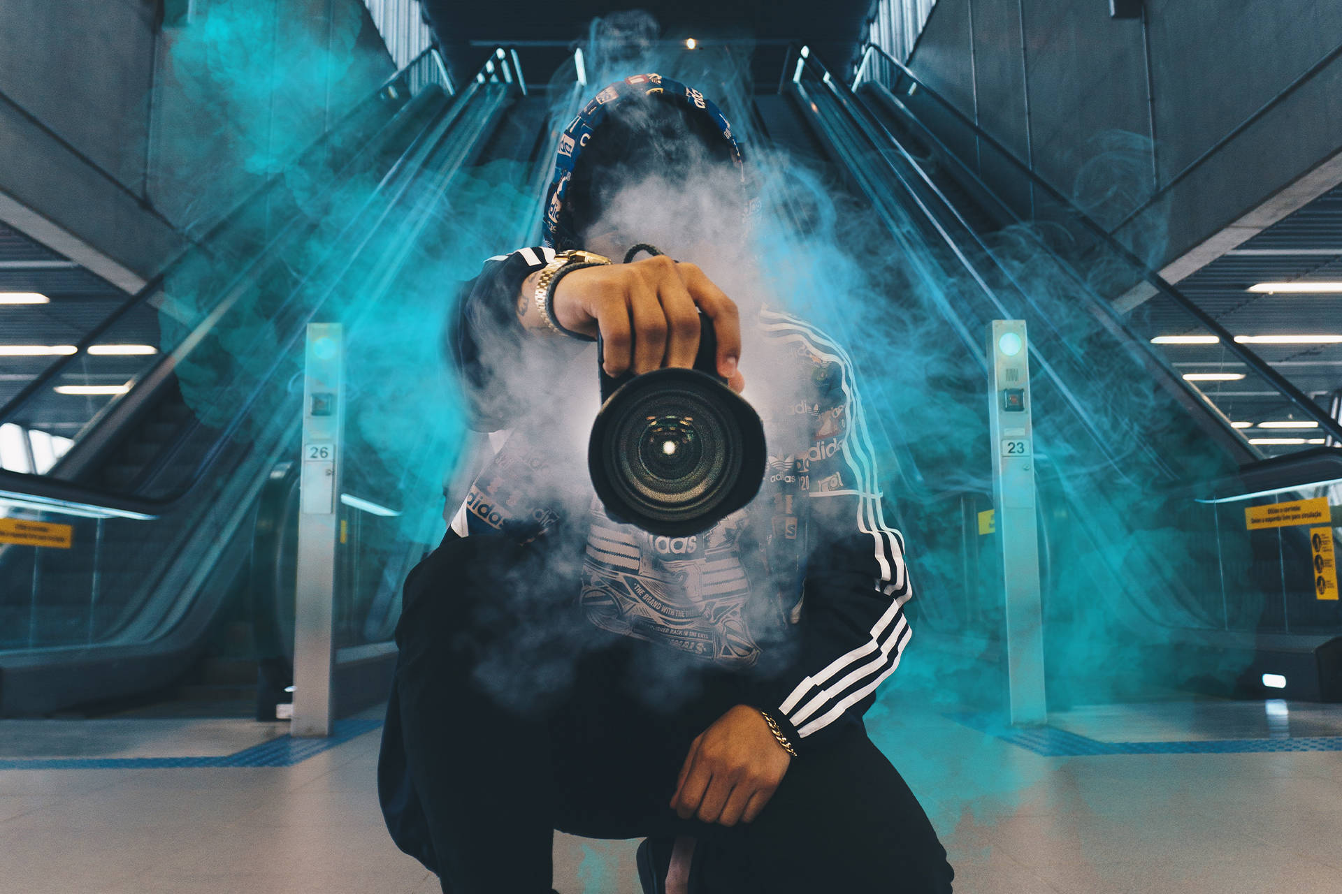 An image of a photographer surrounded by smoke used as part of a sales deck design created by Surfr Media.