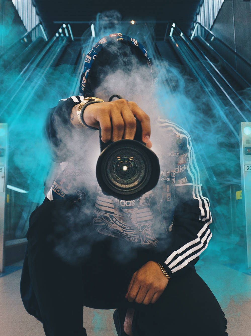 An image of a photographer surrounded by smoke used as part of a sales deck design created by Surfr Media.