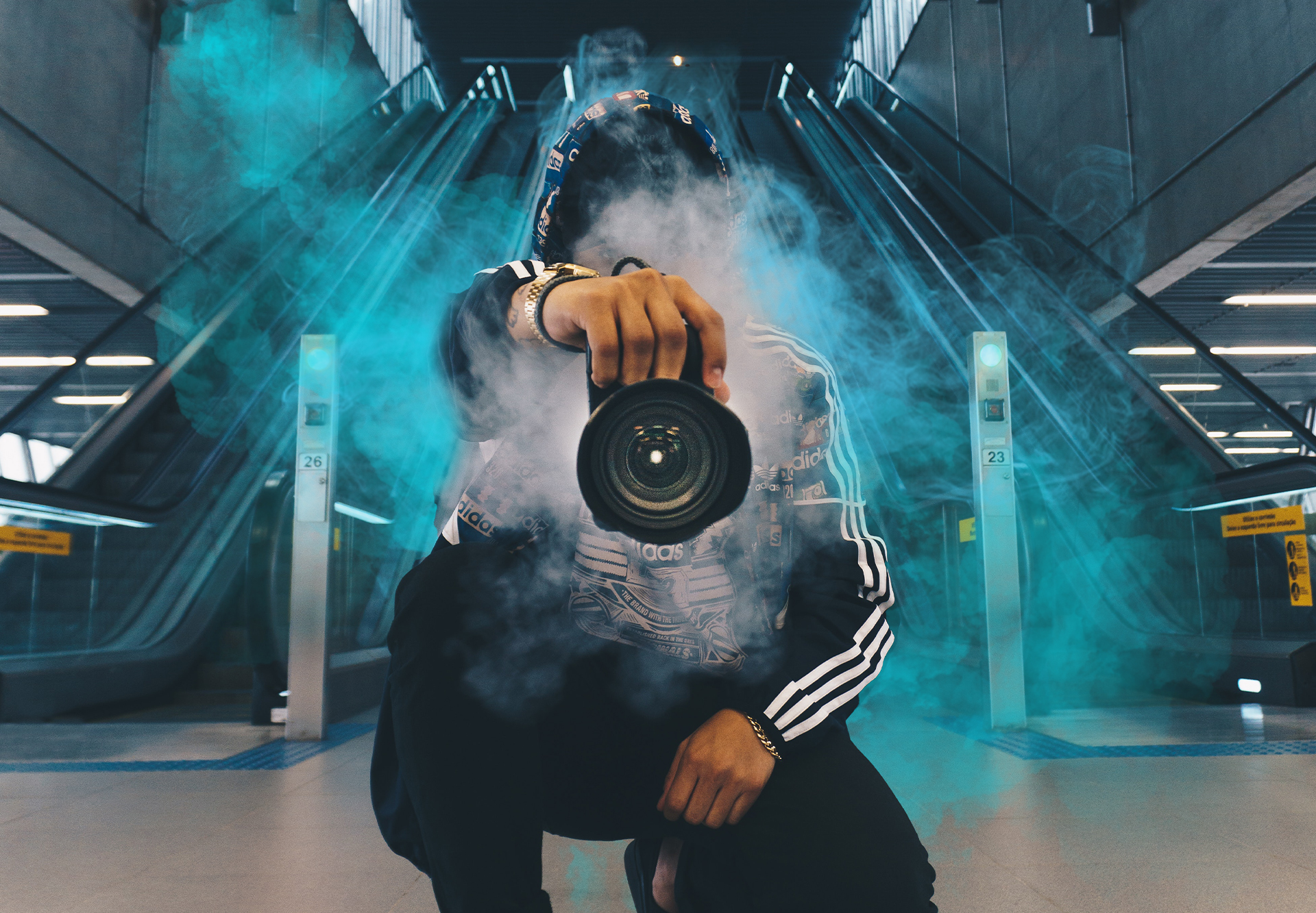 An image of a photographer surrounded by smoke used as part of a sales deck design created by Surfr Media.