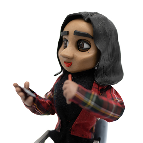 Stop motion puppet character of Tanvi Vyas used inside accessible healthcare environment during animation production.