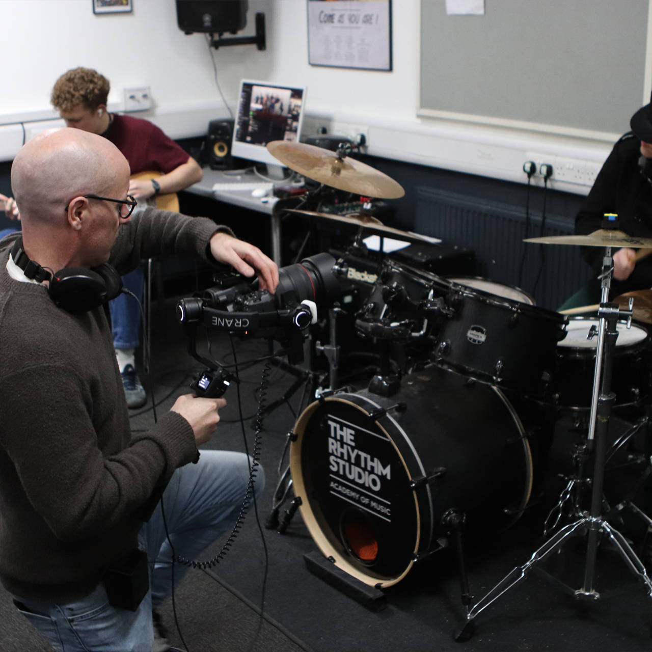 Neurodiverse student at music studio during Burlington House School promotional video production in London.