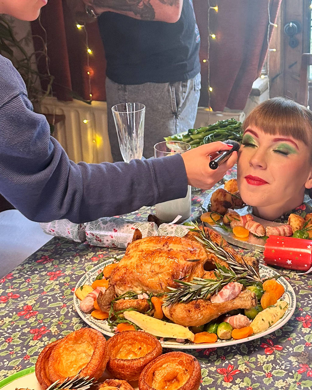 Behind the scenes filming a Christmas dinner scene for the 'Win Christmas' commercial