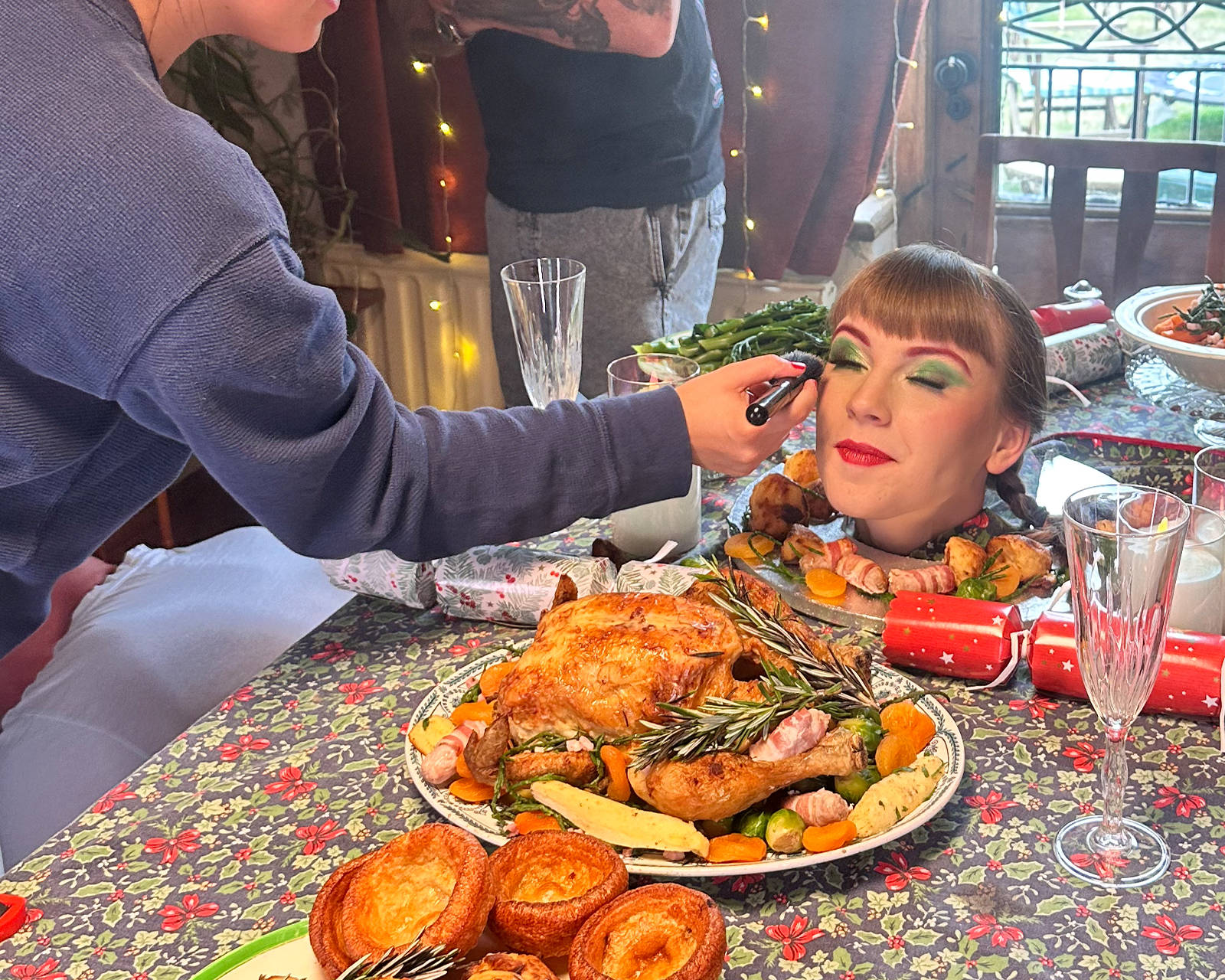 Behind the scenes filming a Christmas dinner scene for the 'Win Christmas' commercial