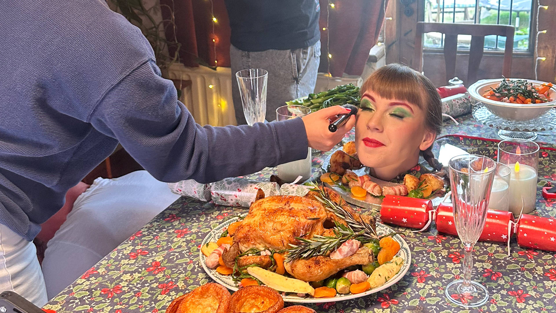 Behind the scenes filming a Christmas dinner scene for the 'Win Christmas' commercial