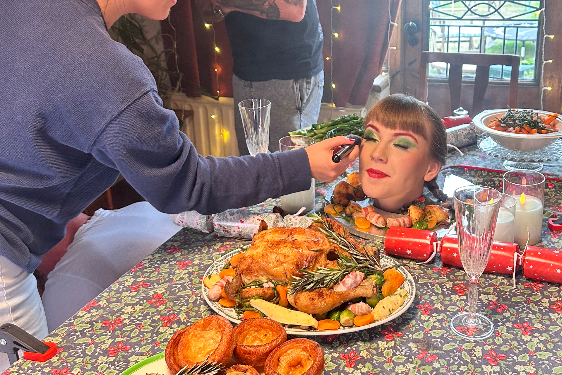 Behind the scenes filming a Christmas dinner scene for the 'Win Christmas' commercial