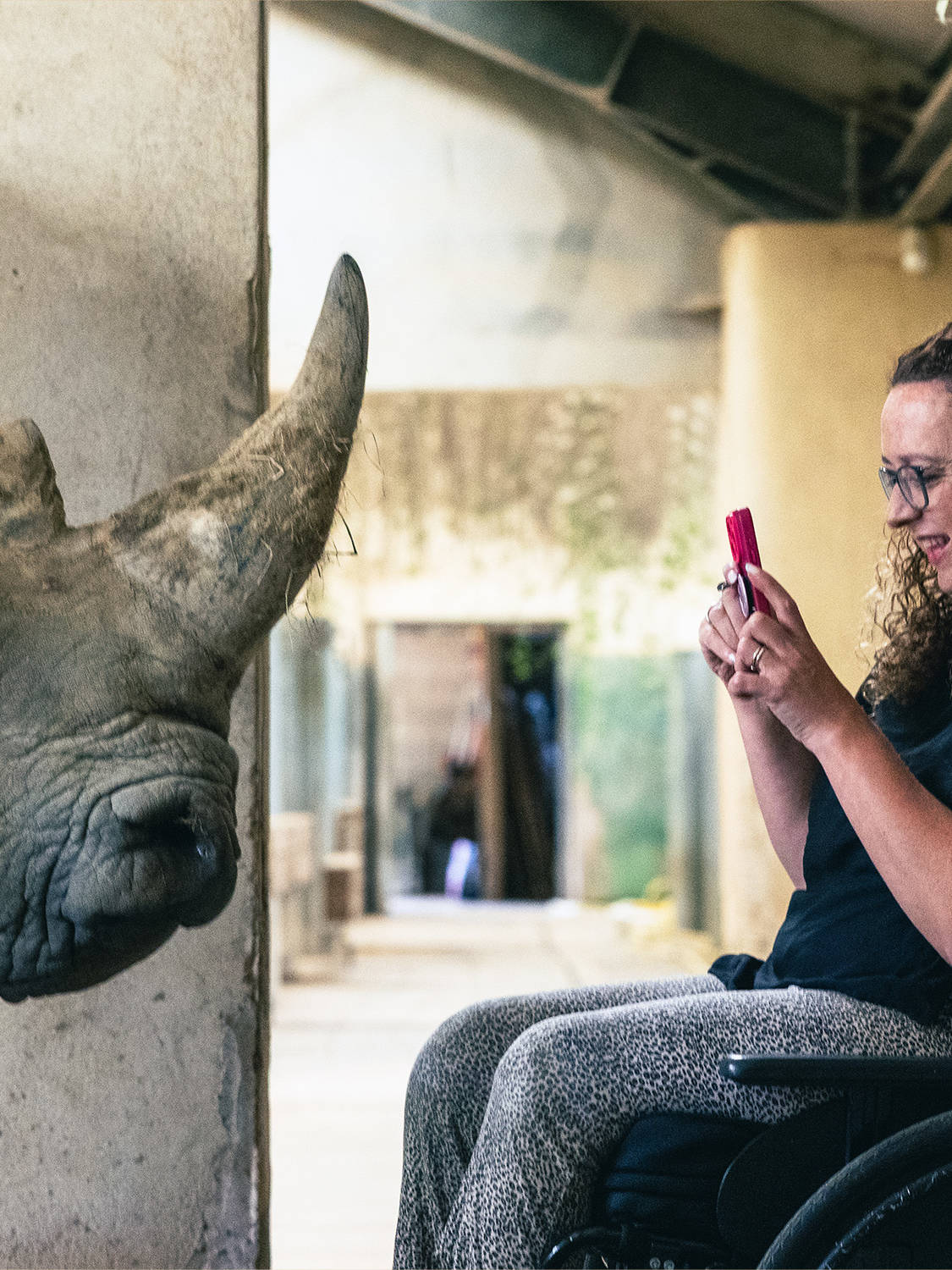Carrie-Ann Lightley photographs a rhino in a zoo