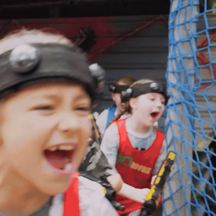 A group of children enjoy playing at an outdoor activity venue in Liverpool