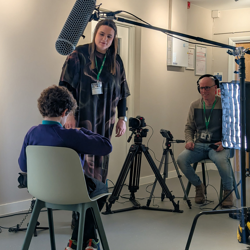 Experienced videographers film an interview in Surrey