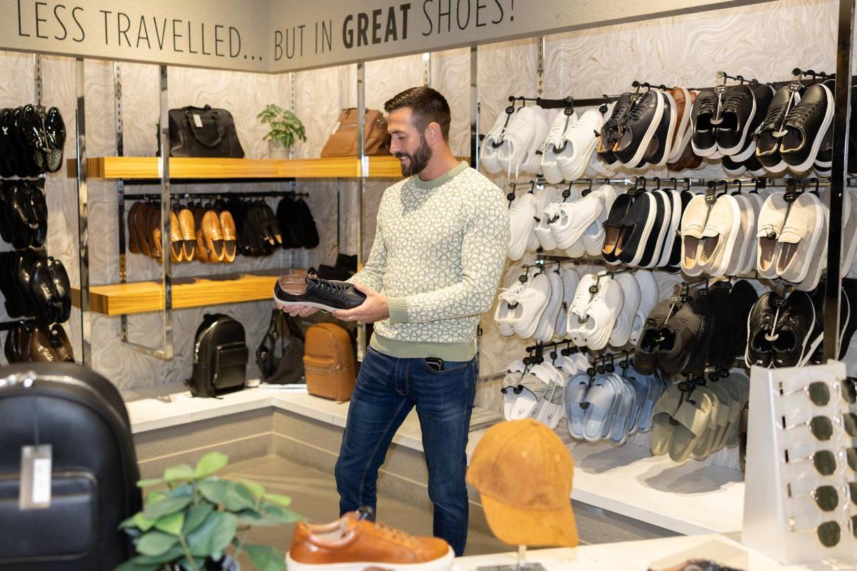 A model shopping inside River Island at Eagles Meadow Shopping Centre Wrexham.