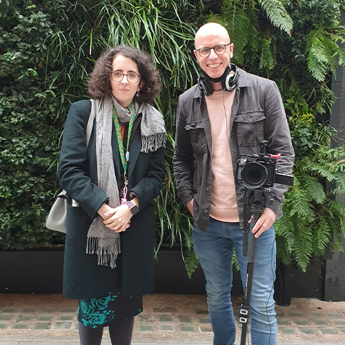 Lydia Wilkins and Matt Bell pose for a photo during an accessibility video shoot in London.