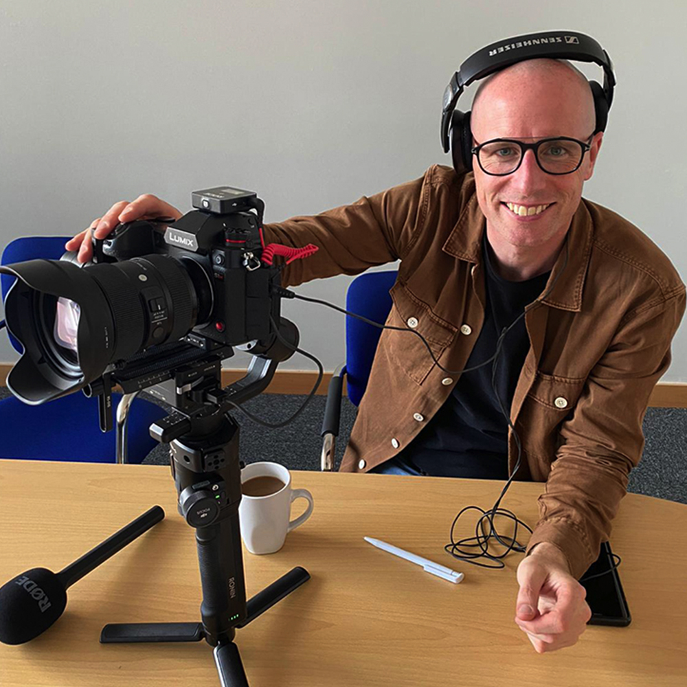 Matt Bell on a corporate video shoot at a retail park in Liverpool.