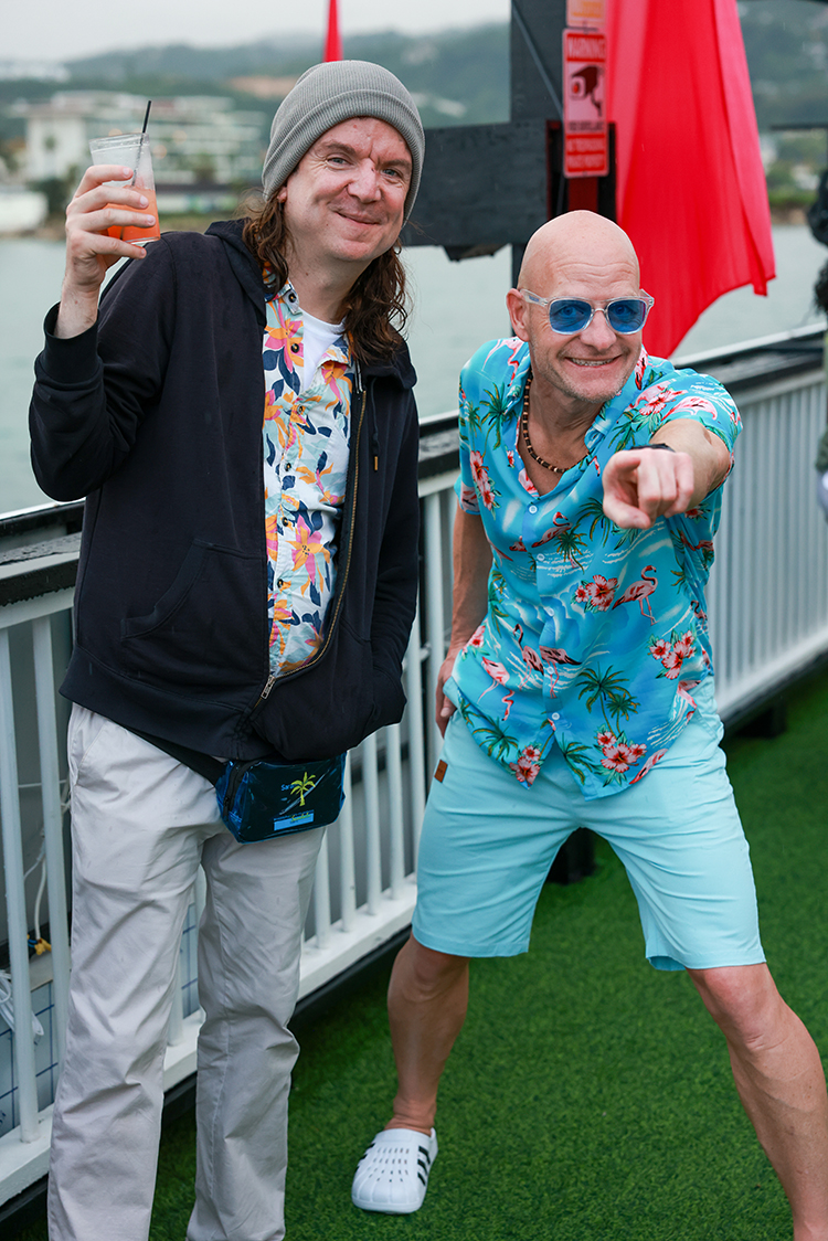 Canadian radio hosts pose for a photo by Southport corporate photography expert Matt Bell.
